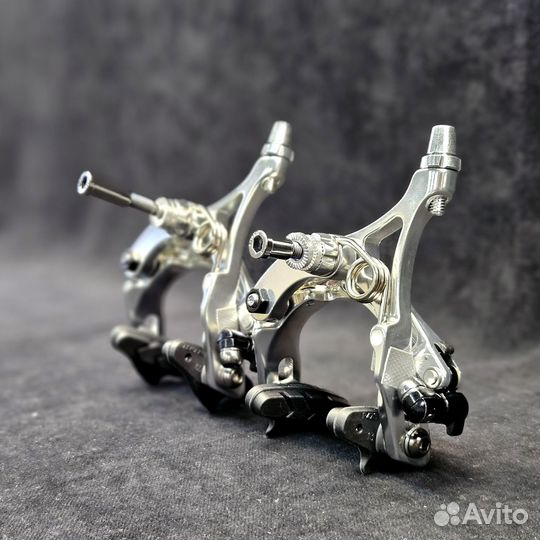 Комплект клещевых тормозов (передний и задний) Tek