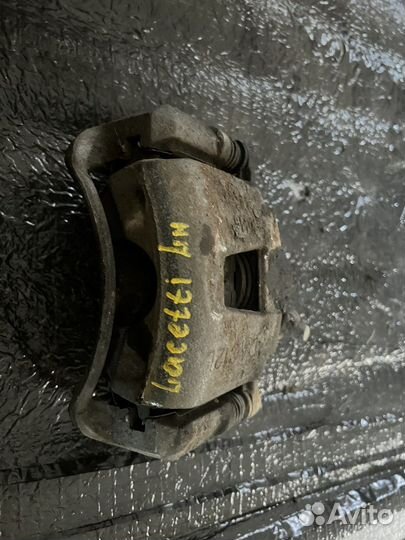Тормозной суппорт передний Chevrolet Lacetti