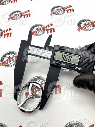 Знак руля Mazda 57/46мм (хром)