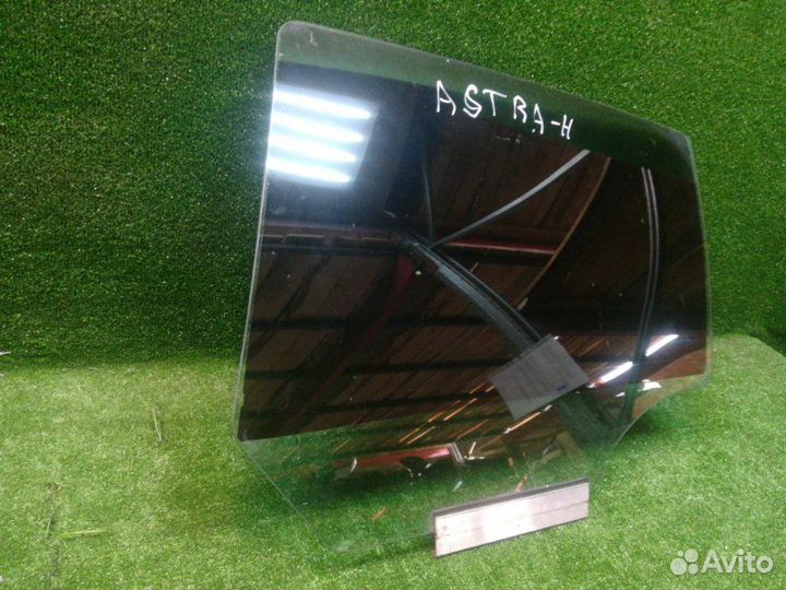 Стекло двери заднее левое Opel Astra H 2004-2010