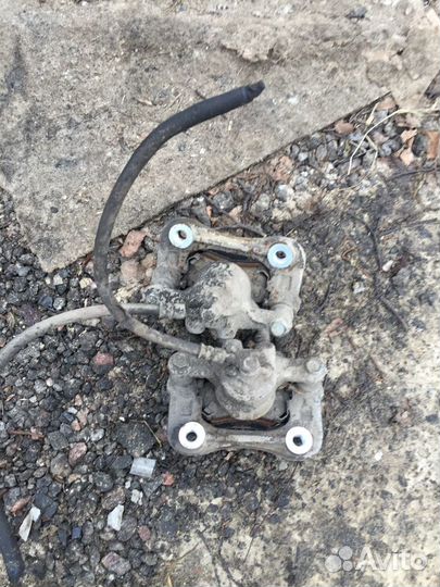 Суппорт тормозной задний Kia Sportage 4