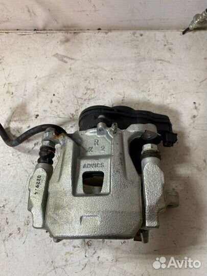 Суппорт тормозной задний правый Mitsubishi