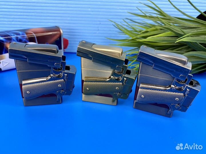 Зажигалка кремневая в виде складного пистолета