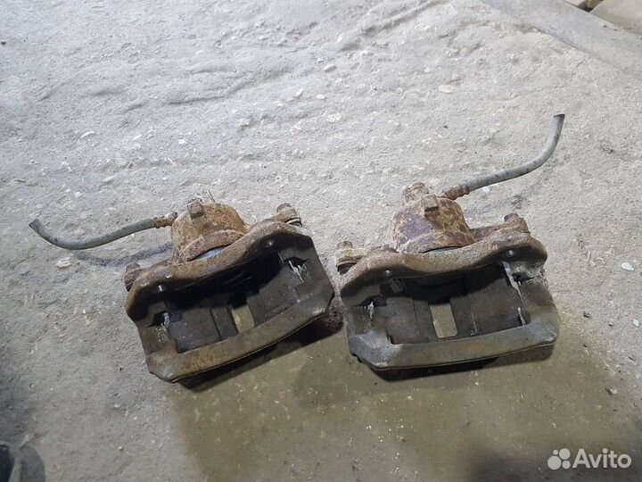 Суппорт передний Nissan Almera N16