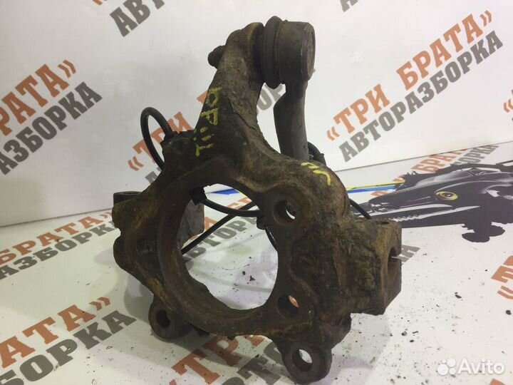 Ниссан Тиида Кулак поворотный передний левый