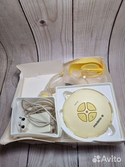 Молокоотсос medela swing электрический