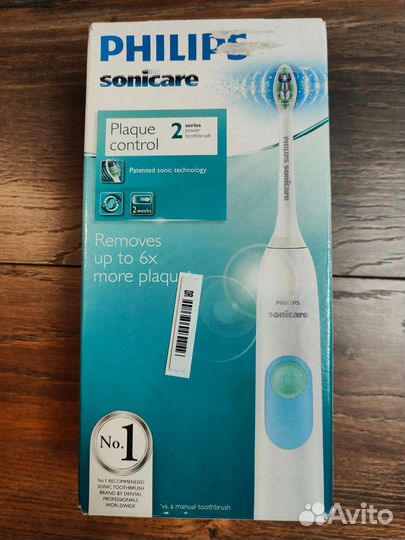 Электрическая зубная щетка philips новая