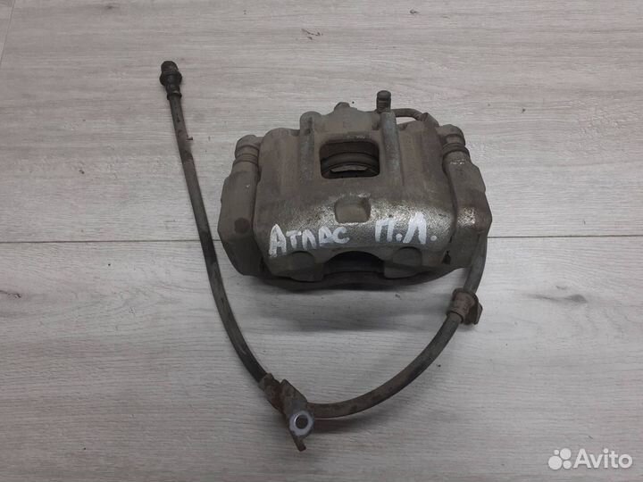 Суппорт передний левый Geely Atlas