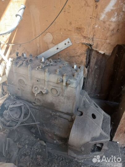 Двигатель газ 52