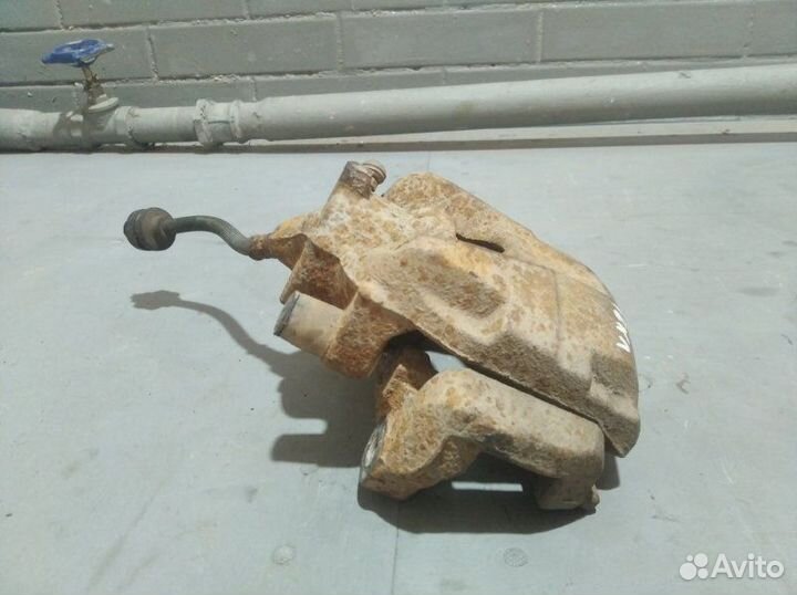 Суппорт тормозной передний левый Renault Duster