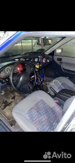 В разборе слепая Mazda 323f BG