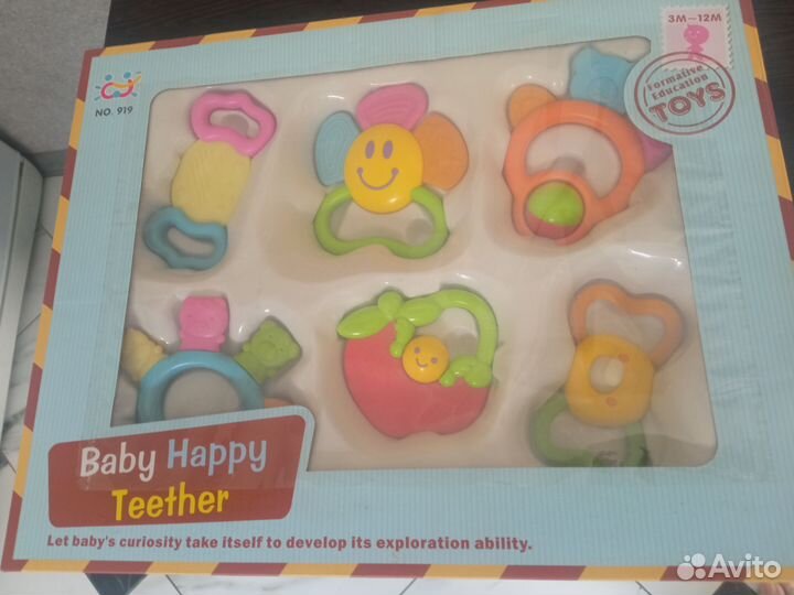 Игрушки погремушки-прорезыватели