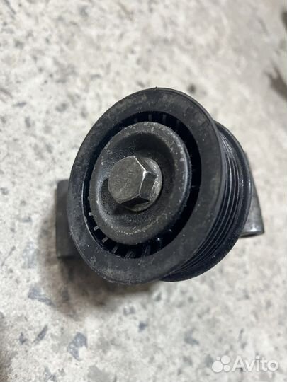 Натяжитель ролика приводов на Фокус 2 2.0