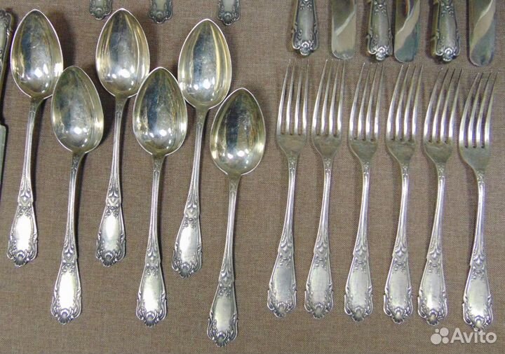 Комплект серебреных столовых приборов 84 проба