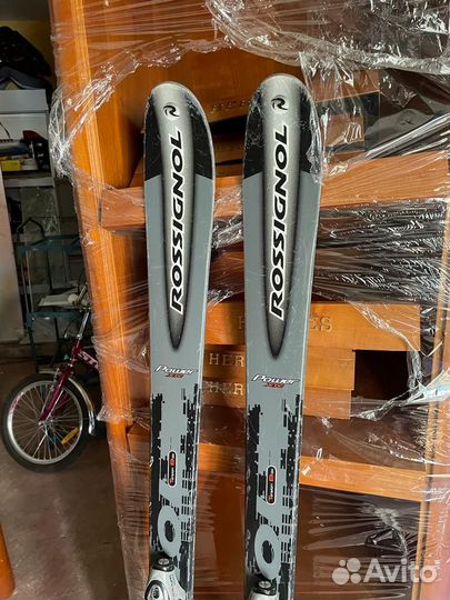 Горные лыжи и ботинки Rossignol