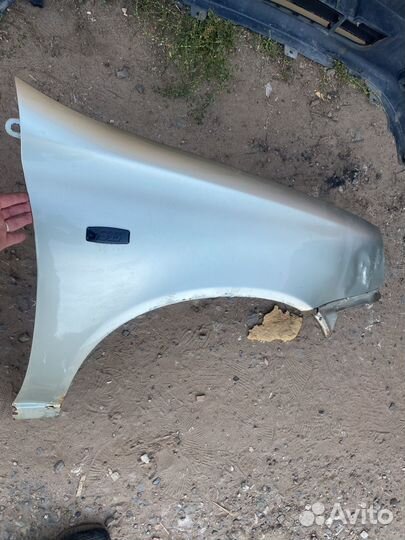 Крылья на LADA Kalina 1 правое Дыня 502