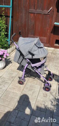 Прогулочная коляска трость