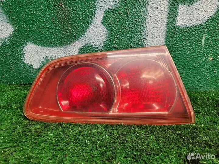 Фонарь задний внутренний левый Mitsubishi Lancer X