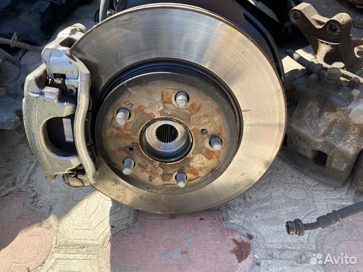 Стойка кулак диск Toyota corolla E210 передняя