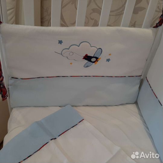 Детская кроватка с универсальным маятником