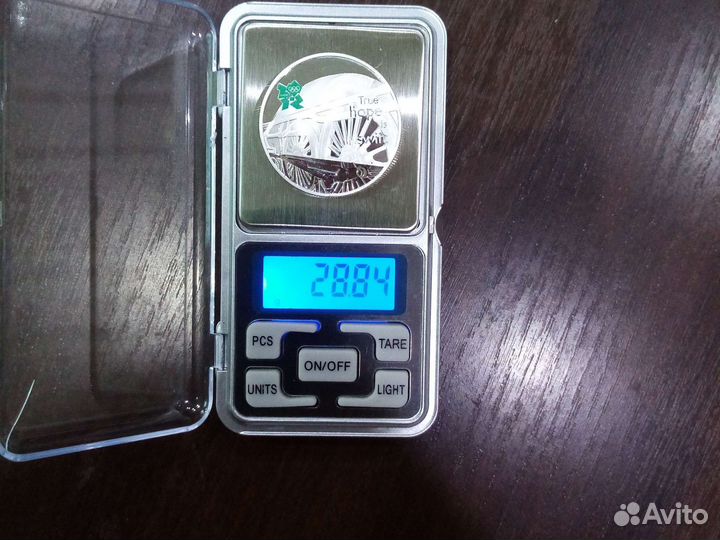 Серебряная монета Великобритании к олимпиаде 2012г