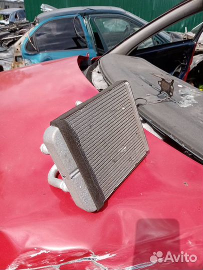 Радиатор печки KIA spectra