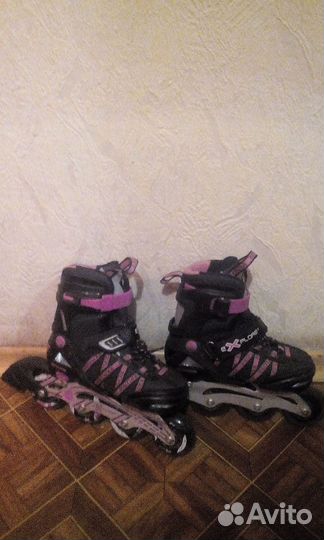 Роликовые коньки