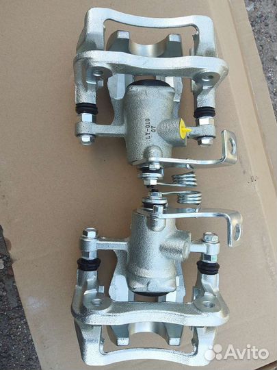 Суппорт задний Хундай solaris