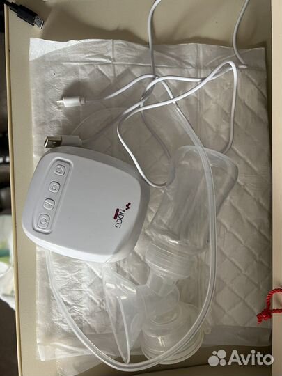 Молокоотсос электрический