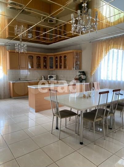 Коттедж 395 м² на участке 25 сот.