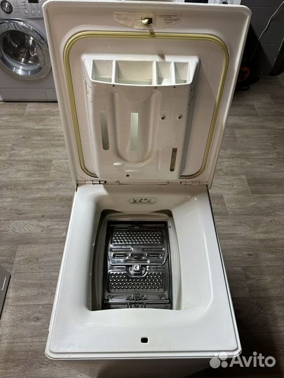 Стиральная машина с вертикальной загрузкой Zanussi