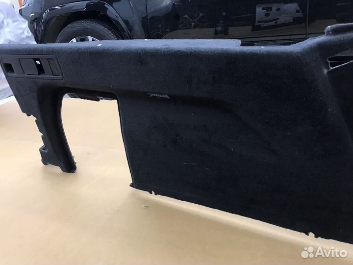 Обшивка багажника X7 (левая)