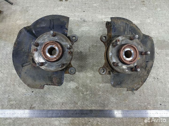 Передний поворотный кулак Kia Sportage 3 / Hyunda