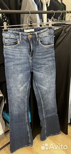 Джинсы с высокой посадкой клеш от колена