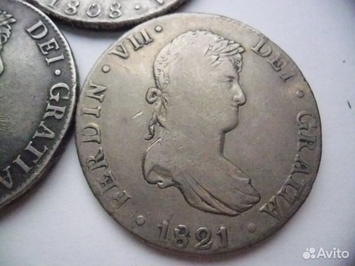 З монеты Испанские Колонии-8реалов.серебро