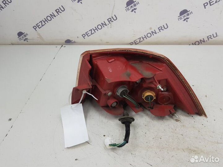 Фонарь задний левый Mitsubishi Lancer