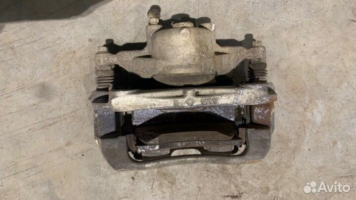 Суппорт тормозной передний левый Chevrolet Cruze