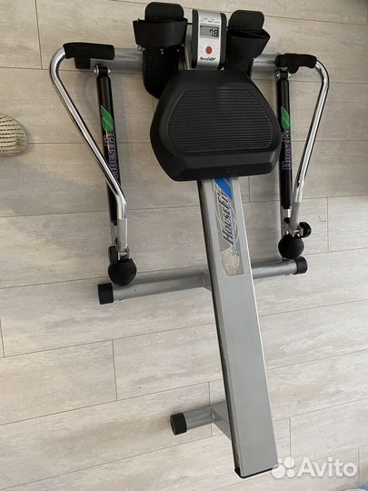 Гребной тренажер