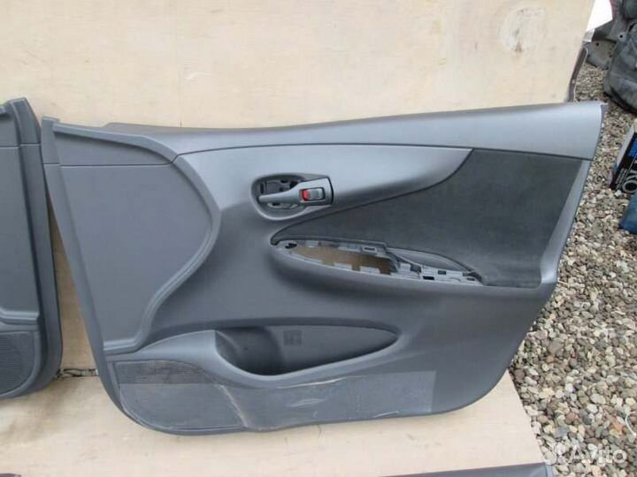 Обшивка дверей Toyota Corolla Fielder NZE141