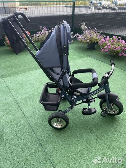 Трехколесный велосипед с ручкой