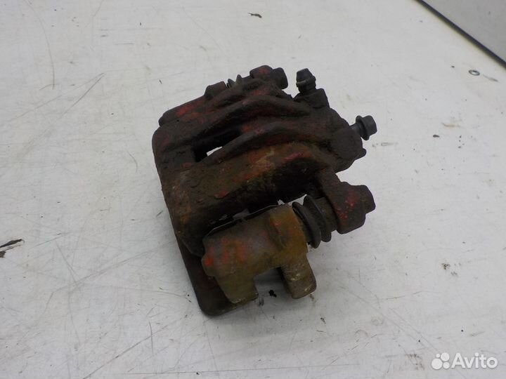 Суппорт тормозной задний левый Kia Cerato 2009