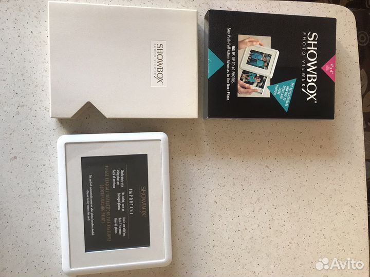 Новая. Рамка для 40 фото Made in Switzerland