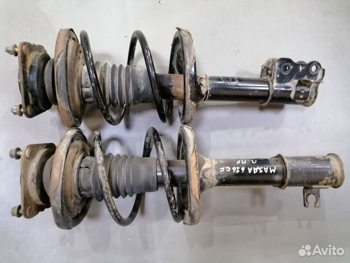 Стойка передняя Mazda 626 (GF) 1997-2002