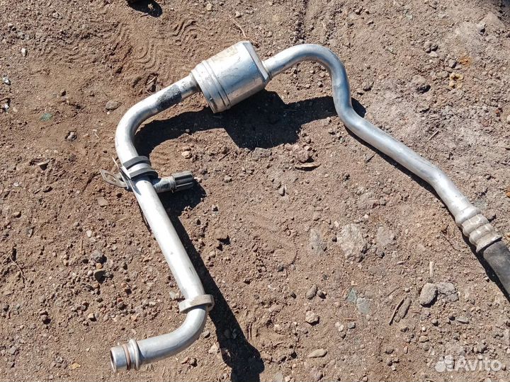 Трубка кондиционера Рено логан 1 2014г.в 1.4 8кл