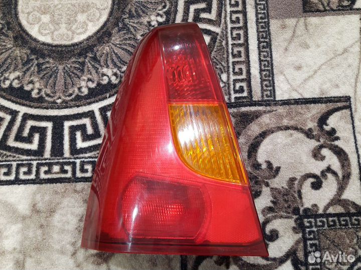 Фонарь задний левый на renault logan 1