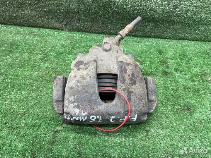 Тормозной суппорт передний левый Ford Focus 2