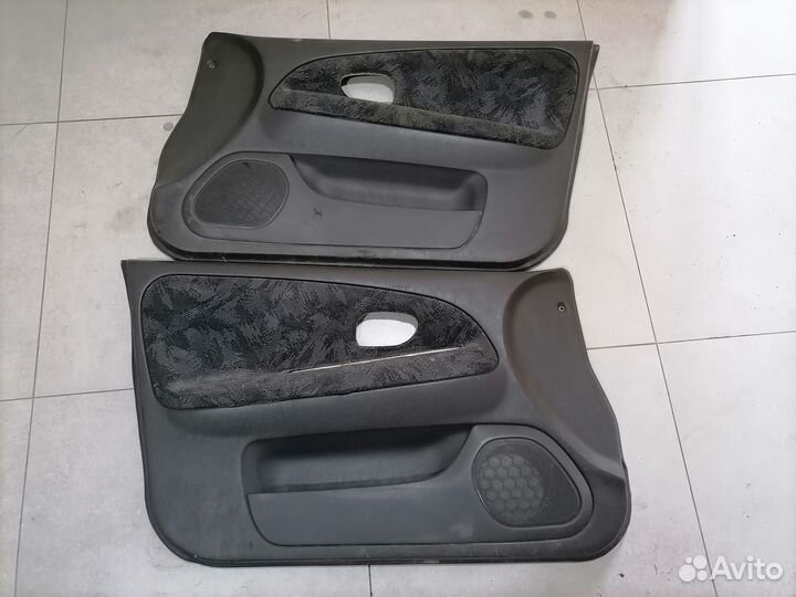 Обшивка дверей перед Mitsubishi Lancer 8 1996-2003