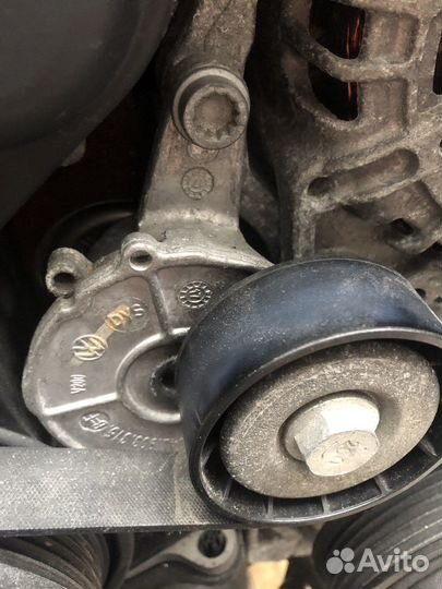 Натяжитель ремня VAG VW 04L903315B