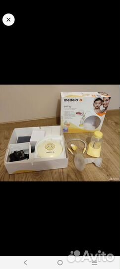Молокоотсос medela swing электрический