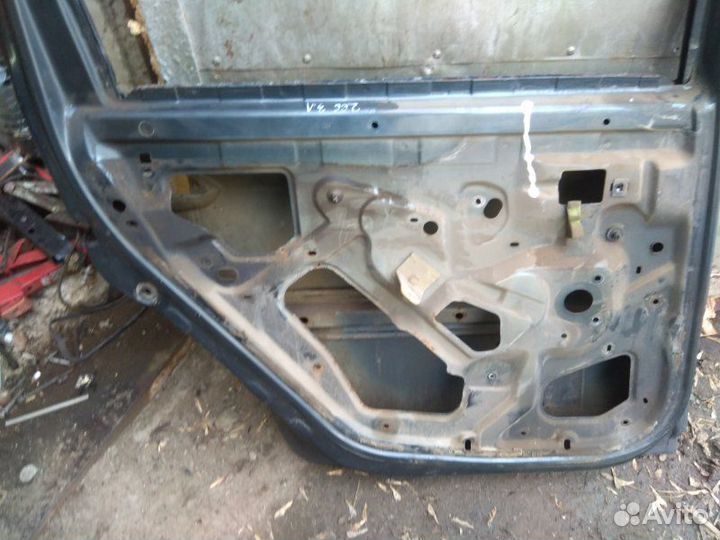 Дверь боковая задняя левая Renault Logan 1
